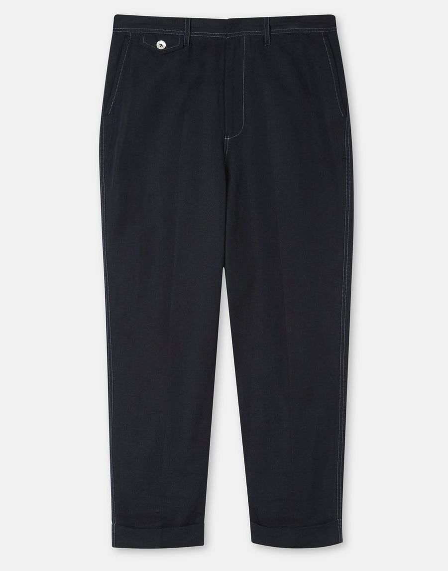 Flatlay of men's dark navy casual trousers