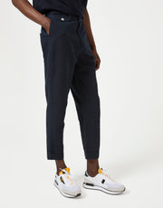 Model wearing men's dark navy casual trousers